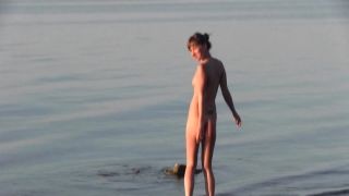 Beautiful Teen Filmed On The Beach